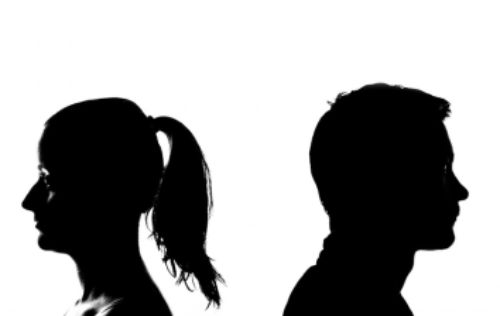 image two people shaking hands with a house belowthem depicting a fixed property transaction concluded